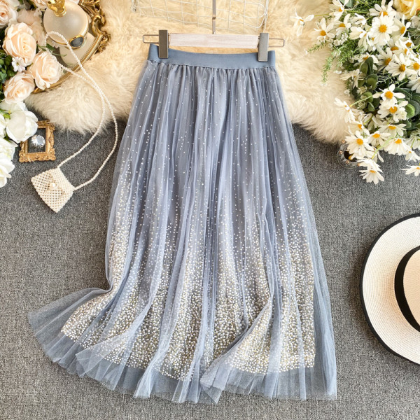 Női pöttyös szoknya magas gallérral és tüllel rózsaszín, bézs, fehér, szürke és fekete színekben