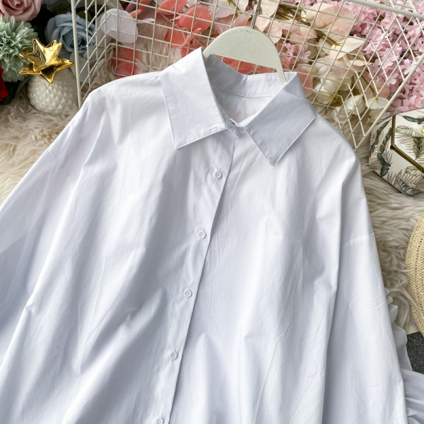 Modern női ing aszimmetrikus modell és klasszikus gallér fehér színben