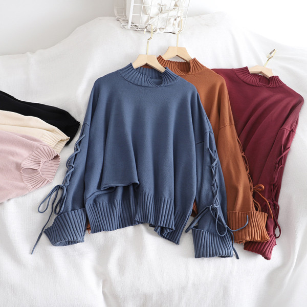 Női pulóver széles modell több színben nyakkendővel és alacsony gallérral