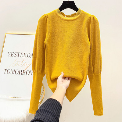 Női téli pulóver szalaggal a hátán és széles ujjakkal fehér, fekete, sárga és fekete színben