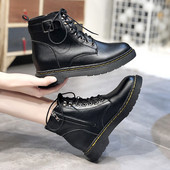 Női bőr téli csizma lapos talppal, fekete színben