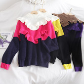 Modern női pulóver három színben alacsony gallérral és fürtökkel