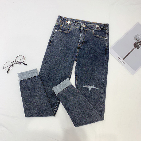 Női hosszú farmer, magas derékkal, sötétszürke színben, szakadt motívummal