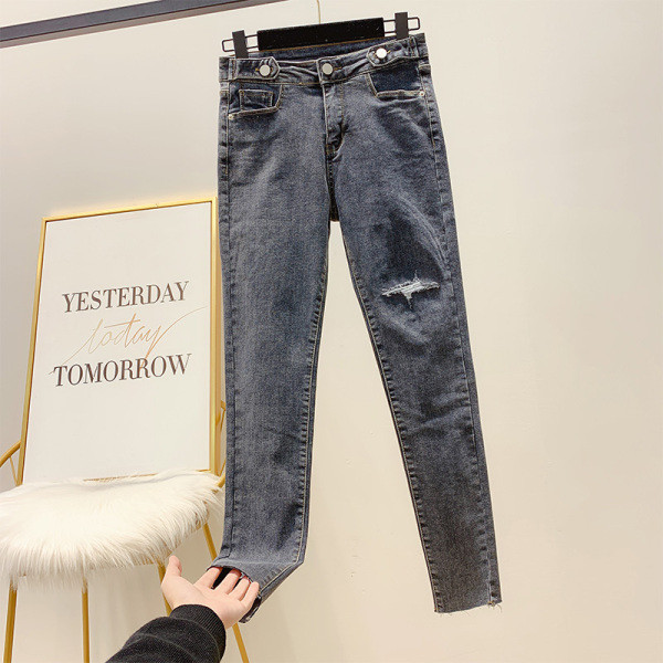 Női hosszú farmer, magas derékkal, sötétszürke színben, szakadt motívummal