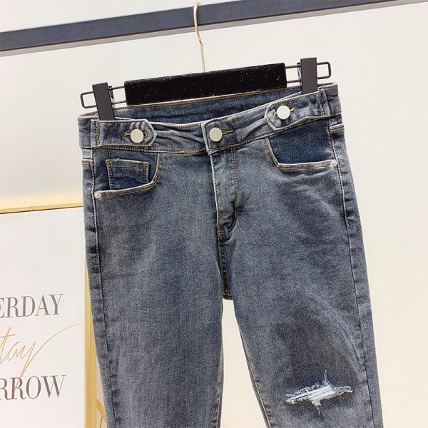 Női hosszú farmer, magas derékkal, sötétszürke színben, szakadt motívummal