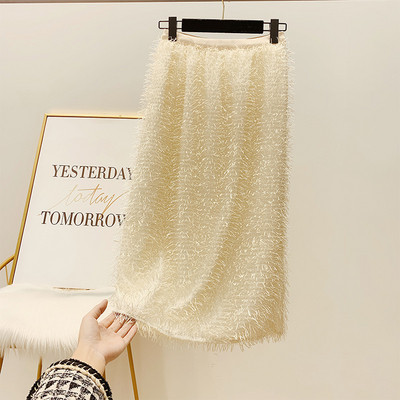 Elegáns női szoknya magas derékkal és rojtokkal bézs és fekete színben