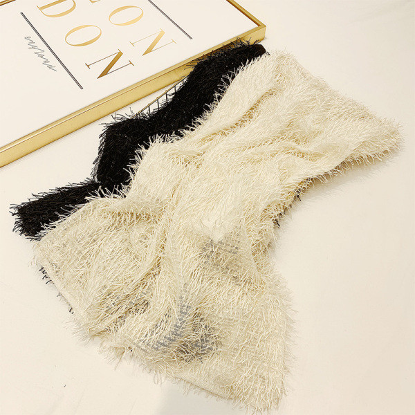 Elegáns női szoknya magas derékkal és rojtokkal bézs és fekete színben