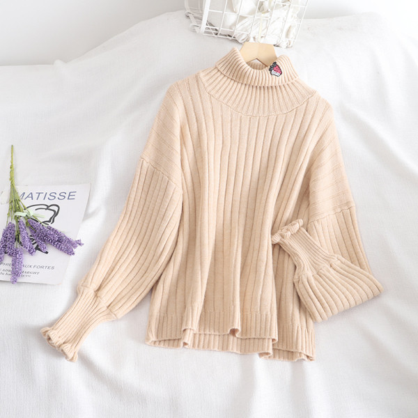 Női pulóver négy színben, széles ujjakkal és hímzéssel