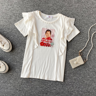 Bluză de damă modernă cu mâneci scurte și aplicație în mov, roz, galben, alb și negru