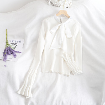 Rózsaszín, fehér és fekete női pulóver szalaggal és lótusz ujjal