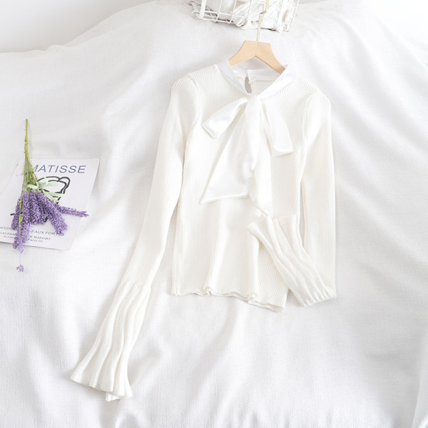 Rózsaszín, fehér és fekete női pulóver szalaggal és lótusz ujjal