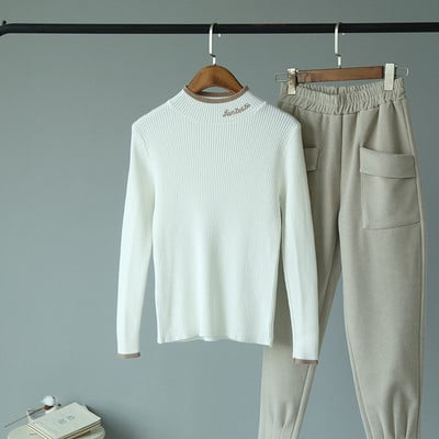 Bluză de damă toamnă-iarnă cu decolteu rotund în albastru, alb, galben, negru și roz