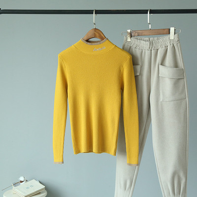 Bluză de damă toamnă-iarnă cu decolteu rotund în albastru, alb, galben, negru și roz