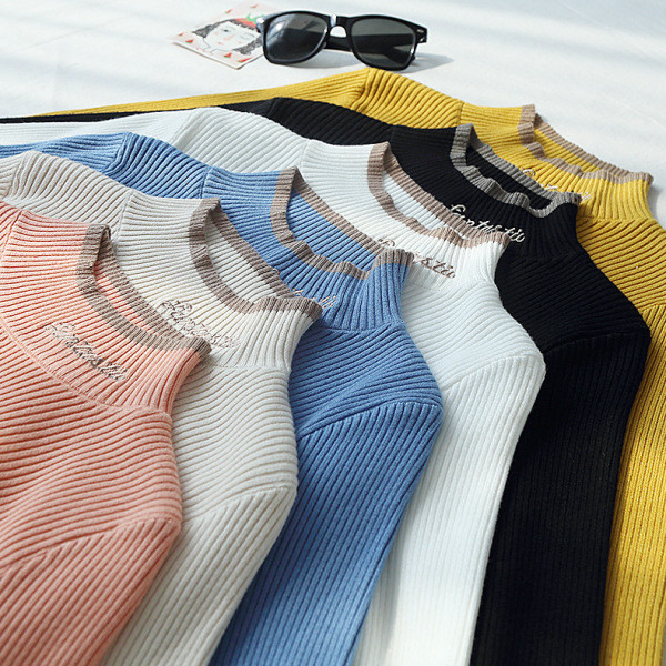 Bluză de damă toamnă-iarnă cu decolteu rotund în albastru, alb, galben, negru și roz