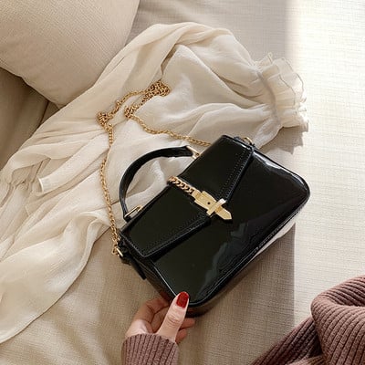 Modern női táska rövid és hosszú fülekkel, fekete, bordó, zöld és piros színben