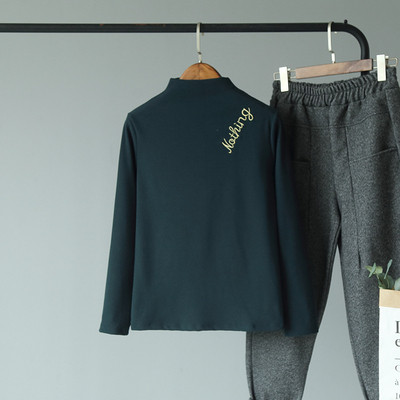 Női őszi-téli blúz fehér, zöld és fekete hímzéssel