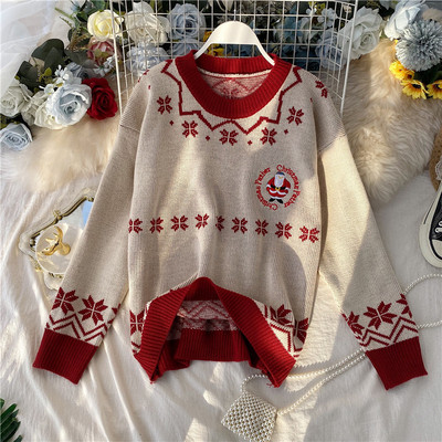 Modern női pulóver ovális nyakkivágással és karácsonyi mintával piros és bézs színben