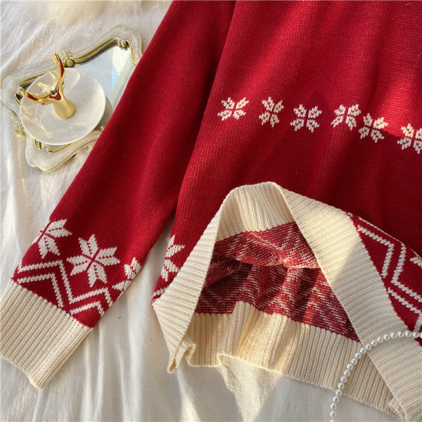 Modern női pulóver ovális nyakkivágással és karácsonyi mintával piros és bézs színben