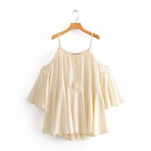 Női felső kivágású modell vékony pántokkal és fürtökkel, bézs színben