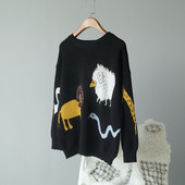 ÚJ Női téli pulóver flitteres elemmel, fekete színben