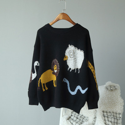 ÚJ Női téli pulóver flitteres elemmel, fekete színben