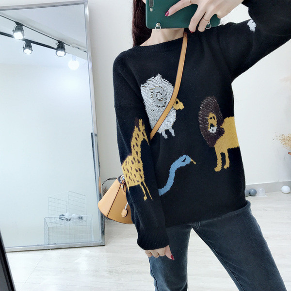 ÚJ Női téli pulóver flitteres elemmel, fekete színben