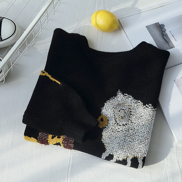 ÚJ Női téli pulóver flitteres elemmel, fekete színben