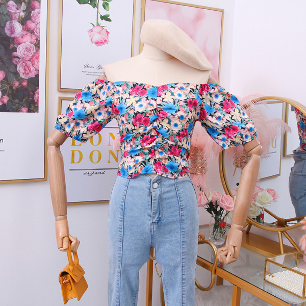 Új modell női blúz virágos motívumokkal és csónakos nyakkivágással, három színben