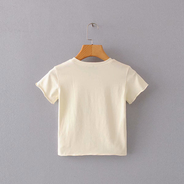 Rövid alkalmi fehér póló, rátéttel és rövid ujjal