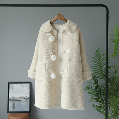 Női téli pehelykabát zöld és bézs színű zsebekkel