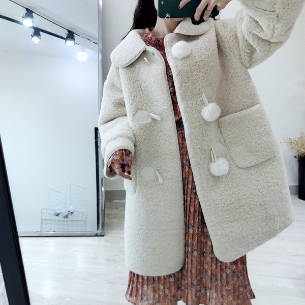 Női téli pehelykabát zöld és bézs színű zsebekkel