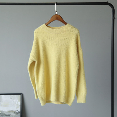 Női téli pulóver kerek nyakkivágással, aszimmetrikus mintával, sárga és lila színben