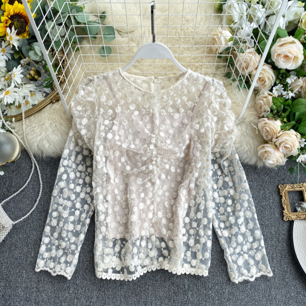 Női csipkeing bézs, fekete és fehér színű puffos ujjakkal és cipzárral