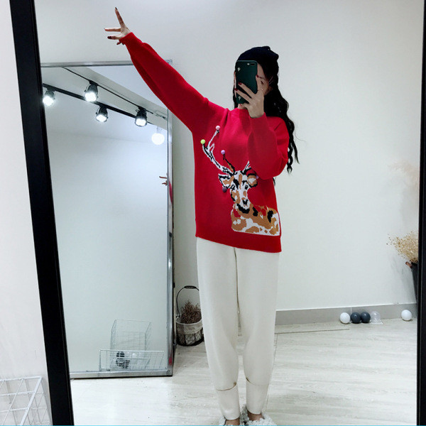 Női téli pulóver, piros-fehér karácsonyi motívumokkal