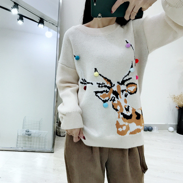 Női téli pulóver, piros-fehér karácsonyi motívumokkal