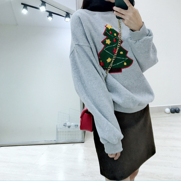 Női őszi-téli blúz kerek nyakkivágással és karácsonyi motívumokkal bézs, sárga és szürke színben