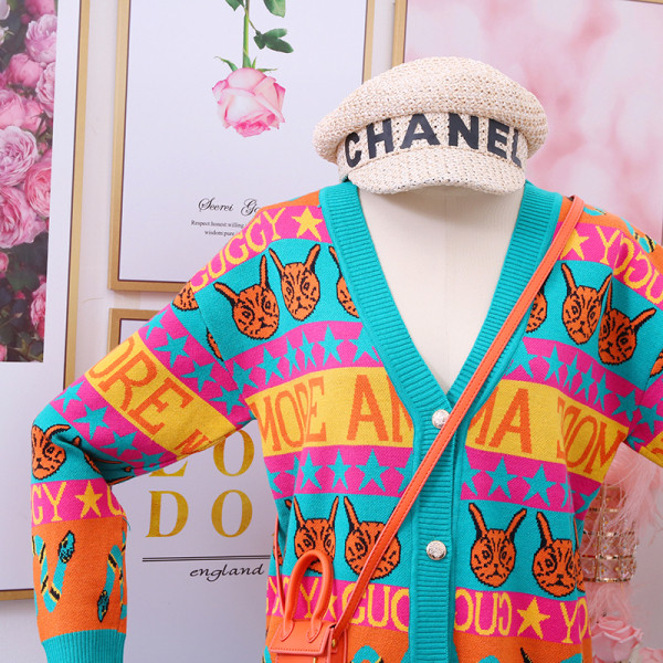 Új modell női kardigán spitz nyakkivágással és gombokkal