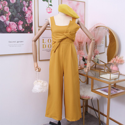 Salopeta de dama moderna cu bretele in negru, roz si galben