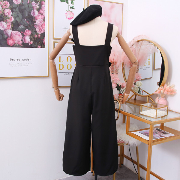 Salopeta de dama moderna cu bretele in negru, roz si galben