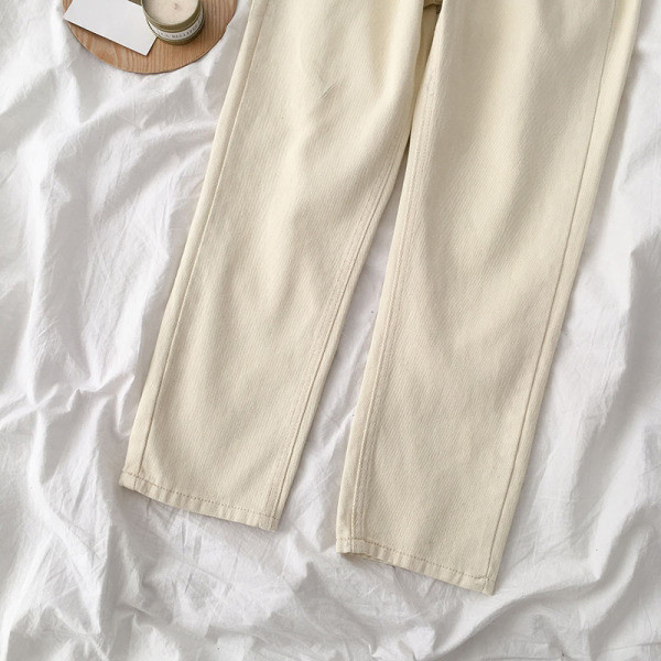 Alkalmi női farmer fekete-fehér színben, gombokkal és magas derékkal