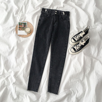 Modern női farmer fekete színben, gombokkal és magas derékkal