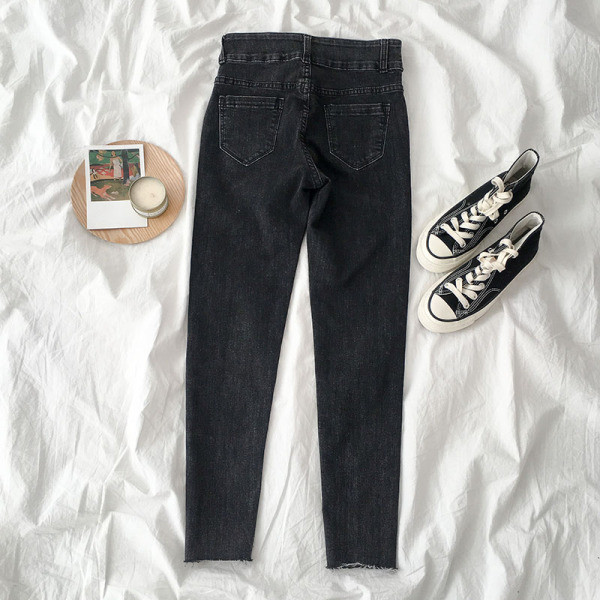 Modern női farmer fekete színben, gombokkal és magas derékkal