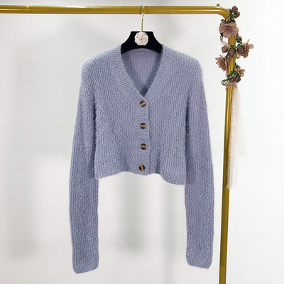 Rövid pehelymellény hosszú ujjal és gombokkal, piros, kék, zöld és fehér színben