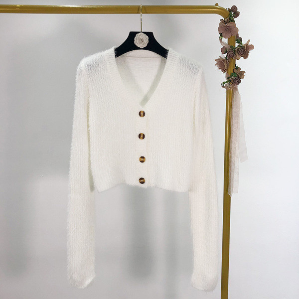 Rövid pehelymellény hosszú ujjal és gombokkal, piros, kék, zöld és fehér színben