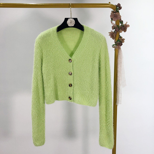 Rövid pehelymellény hosszú ujjal és gombokkal, piros, kék, zöld és fehér színben