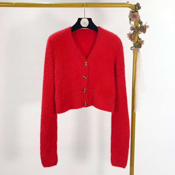 Rövid pehelymellény hosszú ujjal és gombokkal, piros, kék, zöld és fehér színben