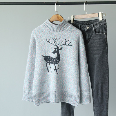 Aktuális női téli pulóver karácsonyi motívummal fehér és kék színben