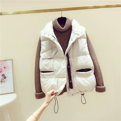 Női őszi-téli mellény zsebekkel és spitzgallérral fekete, bézs és barna színekben