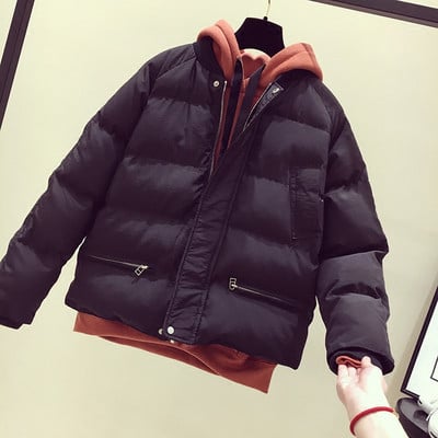 Női alkalmi kabát gombokkal és zsebekkel fekete és bézs színben