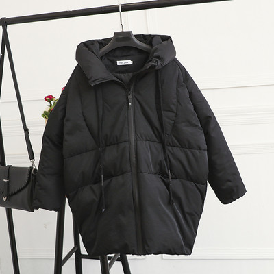 Női őszi-téli kabát széles modell fekete-fehér színben